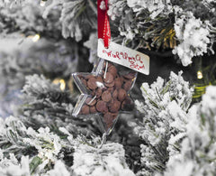 Button-its shape filled with chocolate buttons used as a Christmas Tree Decoration